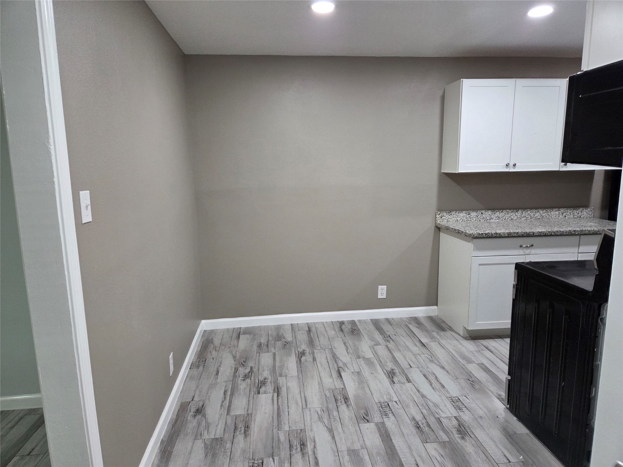 619 13th Street, Unit 2 Galveston, TX 77550 - Photo 3 of 13 Spacious kitchen with a lot of room left for dining.