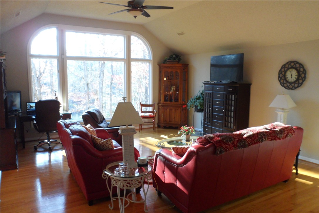 435 Cane Creek Landing Road, Unit SENECA Seneca, SC 29672 - Photo 14 of 43 Enter to open and bright living room from foyer.