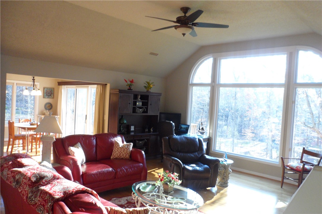 435 Cane Creek Landing Road, Unit SENECA Seneca, SC 29672 - Photo 16 of 43 Living room with wall of windows over looking the