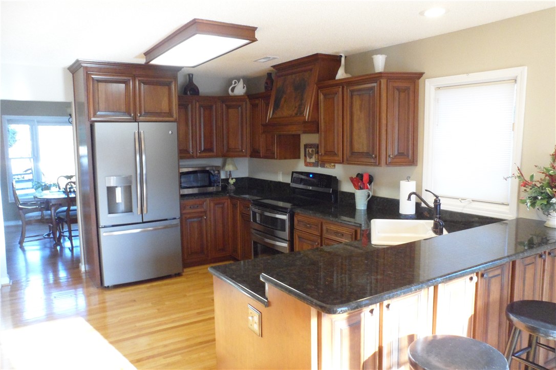 435 Cane Creek Landing Road, Unit SENECA Seneca, SC 29672 - Photo 18 of 43 Large family kitchen with view to formal dining ro