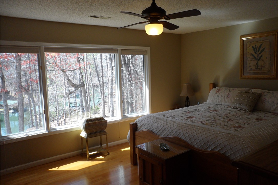 435 Cane Creek Landing Road, Unit SENECA Seneca, SC 29672 - Photo 22 of 43 Master bedroom view of lake