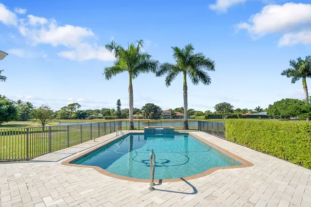 a view of a house with a swimming pool