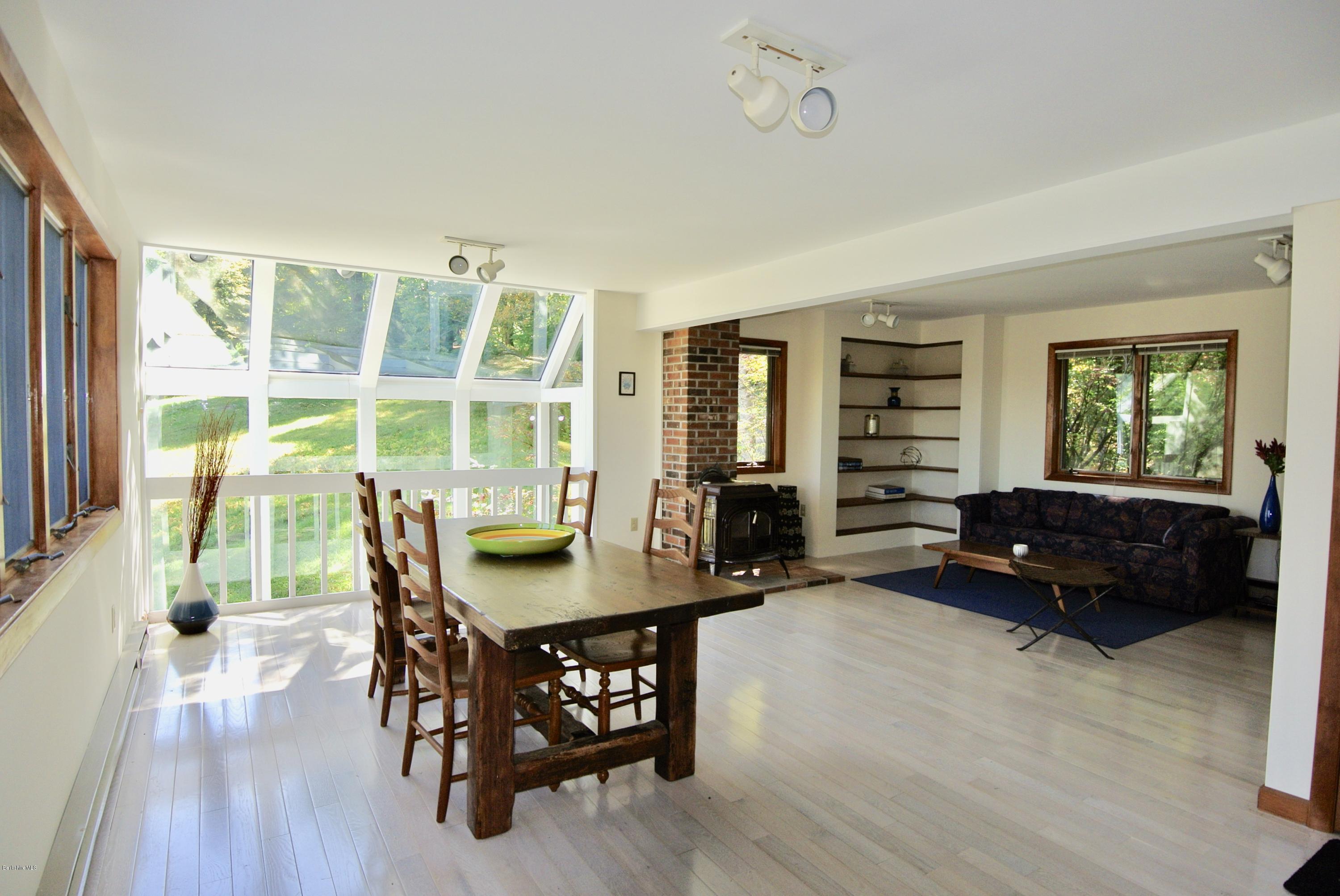 101 Judd Road Otis, MA 01253 - Photo 2 of 29 a living room with furniture and a large window