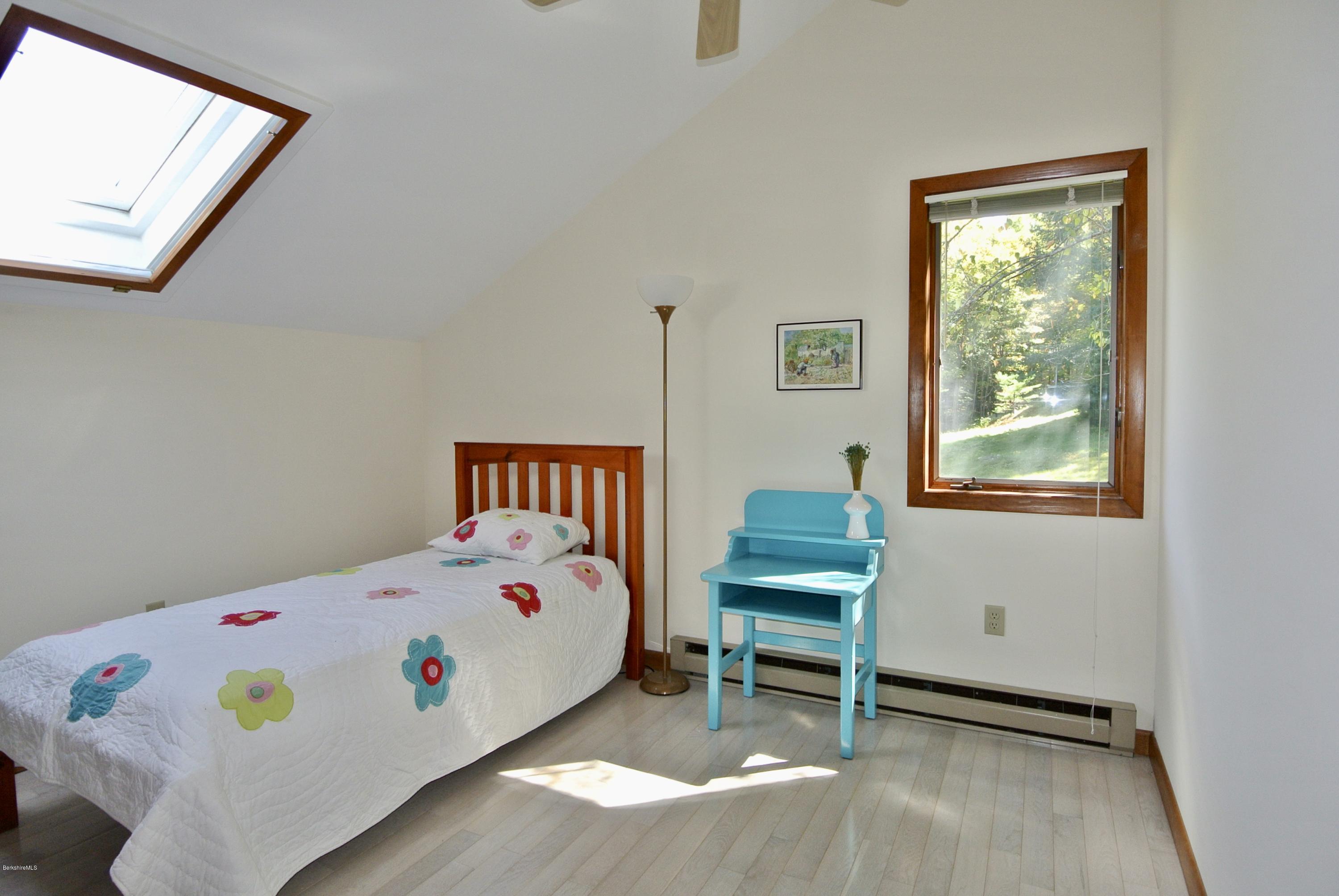 101 Judd Road Otis, MA 01253 - Photo 15 of 29 a bedroom with a bed and a window in it
