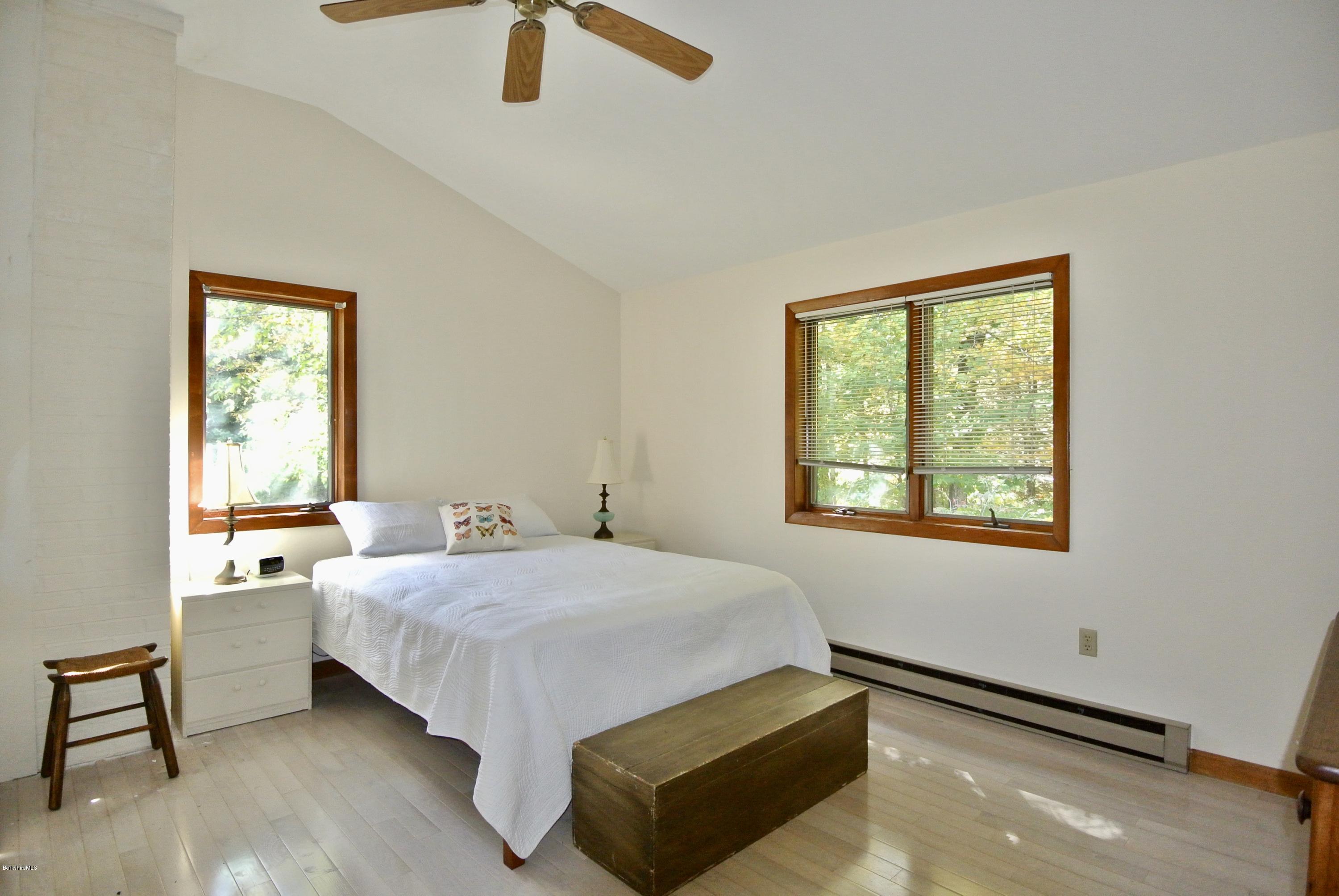 101 Judd Road Otis, MA 01253 - Photo 17 of 29 a bedroom with a bed and window