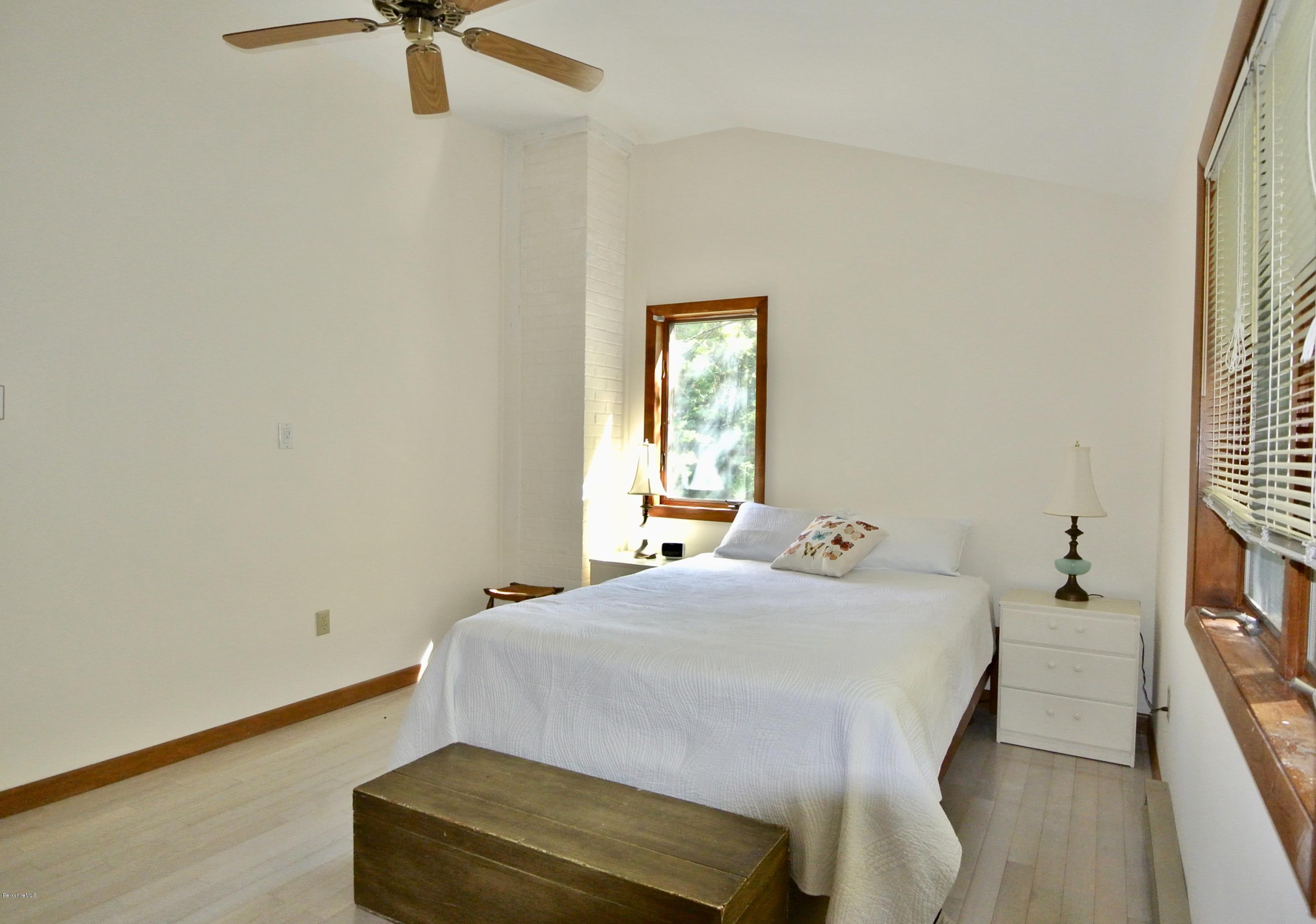 101 Judd Road Otis, MA 01253 - Photo 18 of 29 a bedroom with a bed and a window