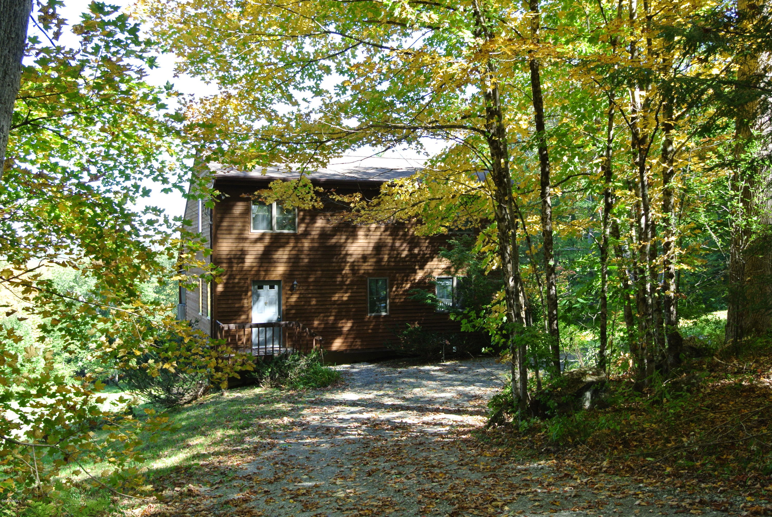 101 Judd Road Otis, MA 01253 - Photo 26 of 29 a view of a tree in front of a house