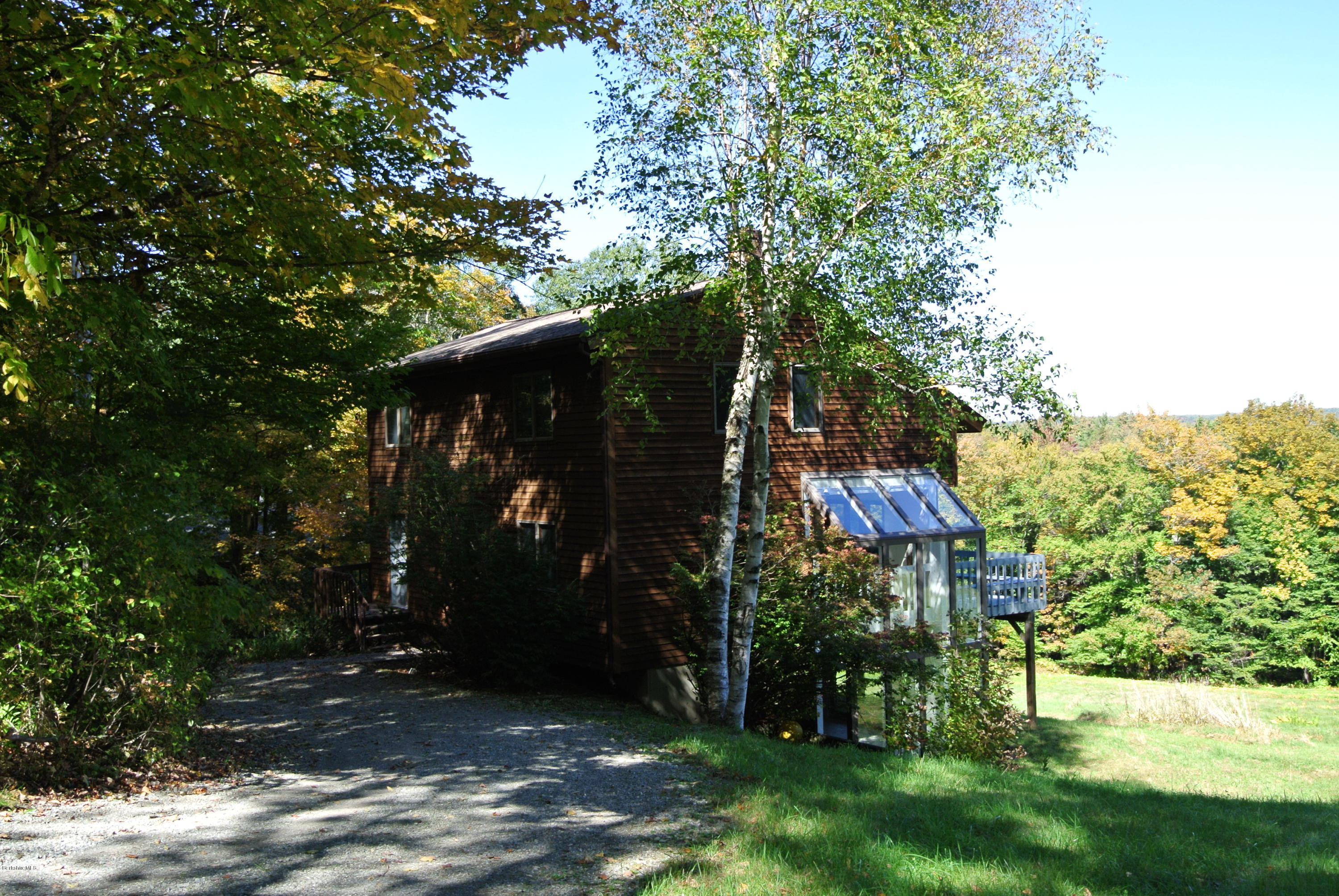 101 Judd Road Otis, MA 01253 - Photo 28 of 29 a view of backyard with plants and outdoor seating