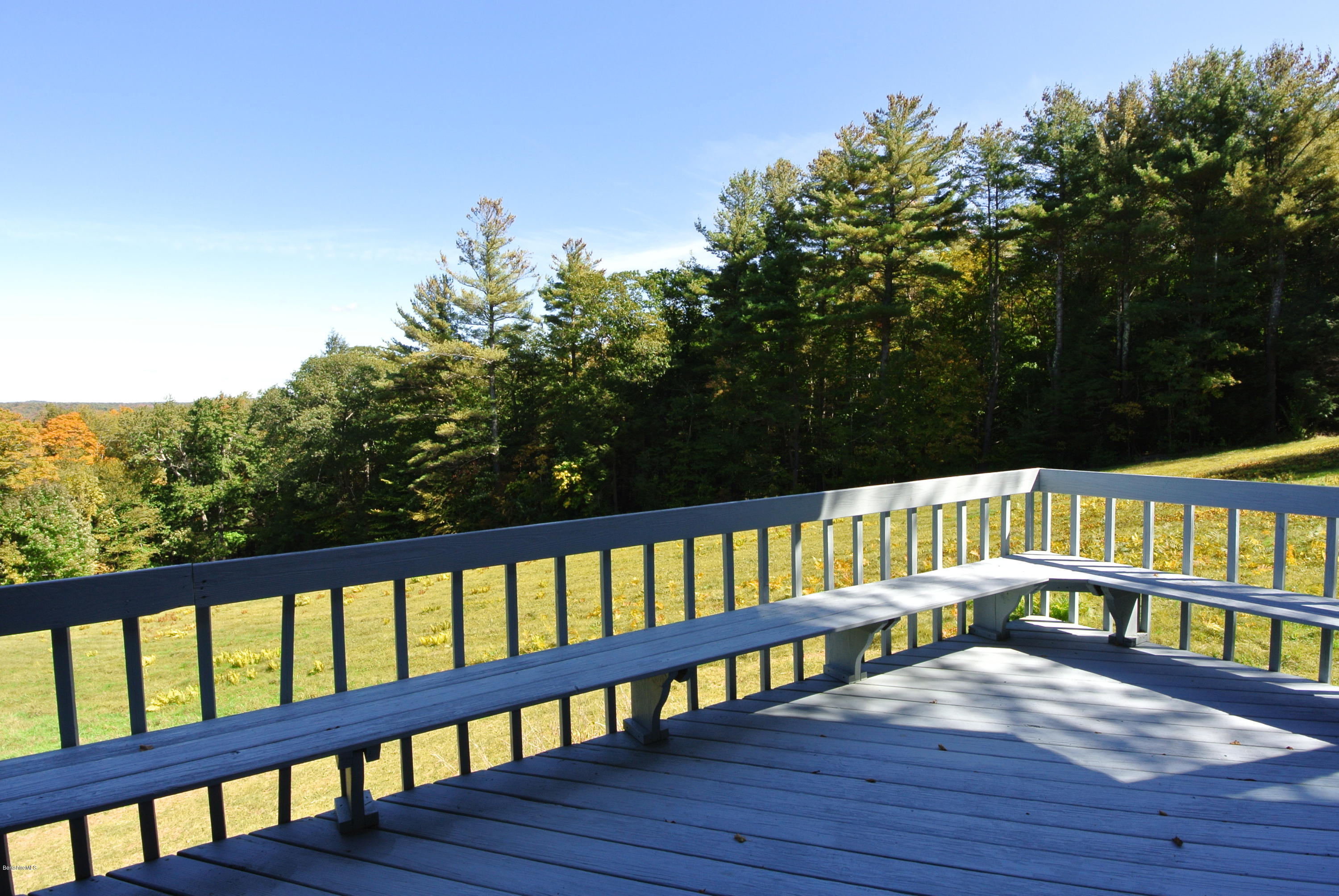 101 Judd Road Otis, MA 01253 - Photo 9 of 29 a view of balcony with wooden floor