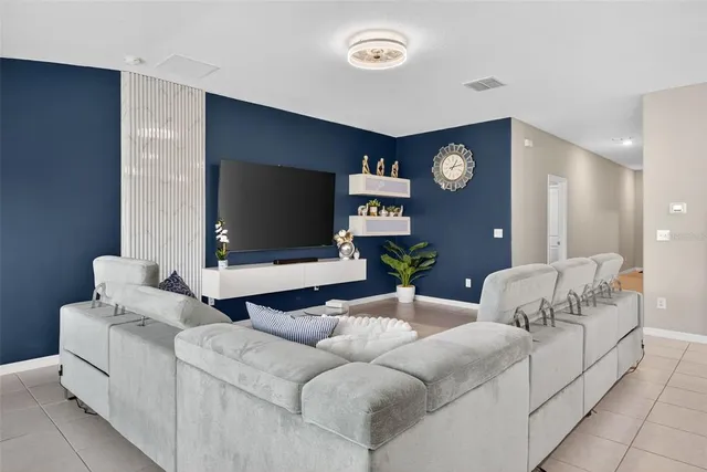 a living room with furniture and a table