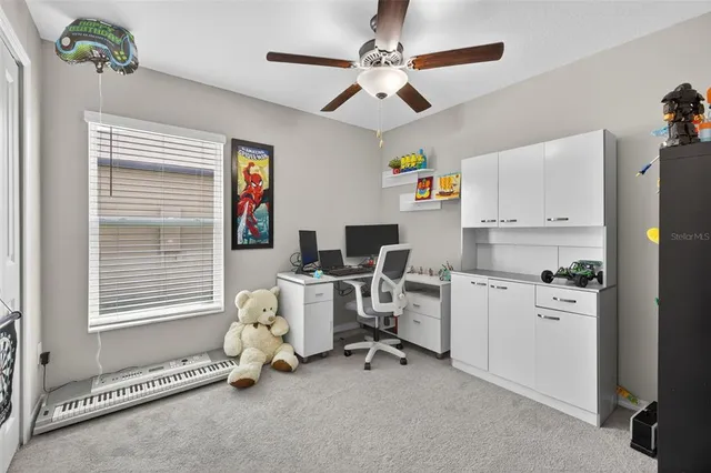 a view of livingroom with furniture and window