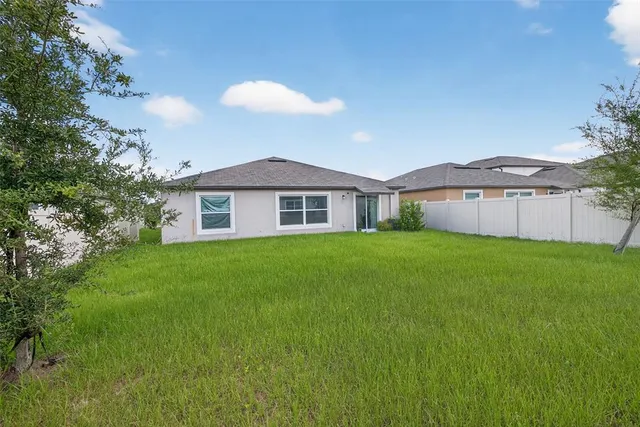 a view of a house with a swimming pool