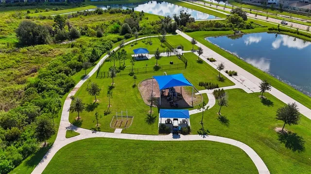 a aerial view of a house with a garden and plants