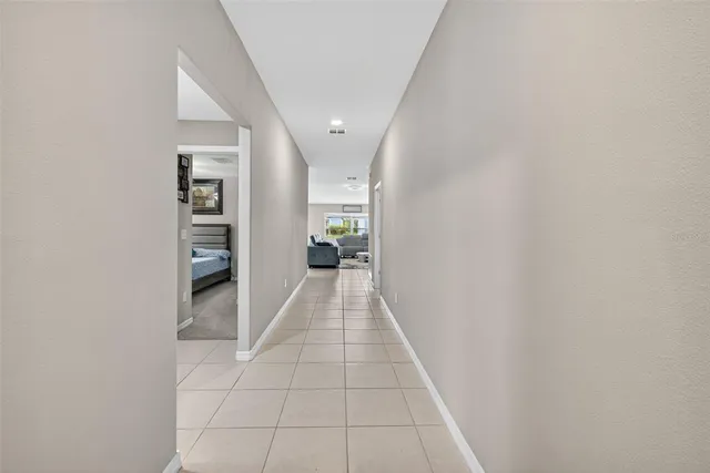 a kitchen with stainless steel appliances granite countertop a refrigerator sink and cabinets