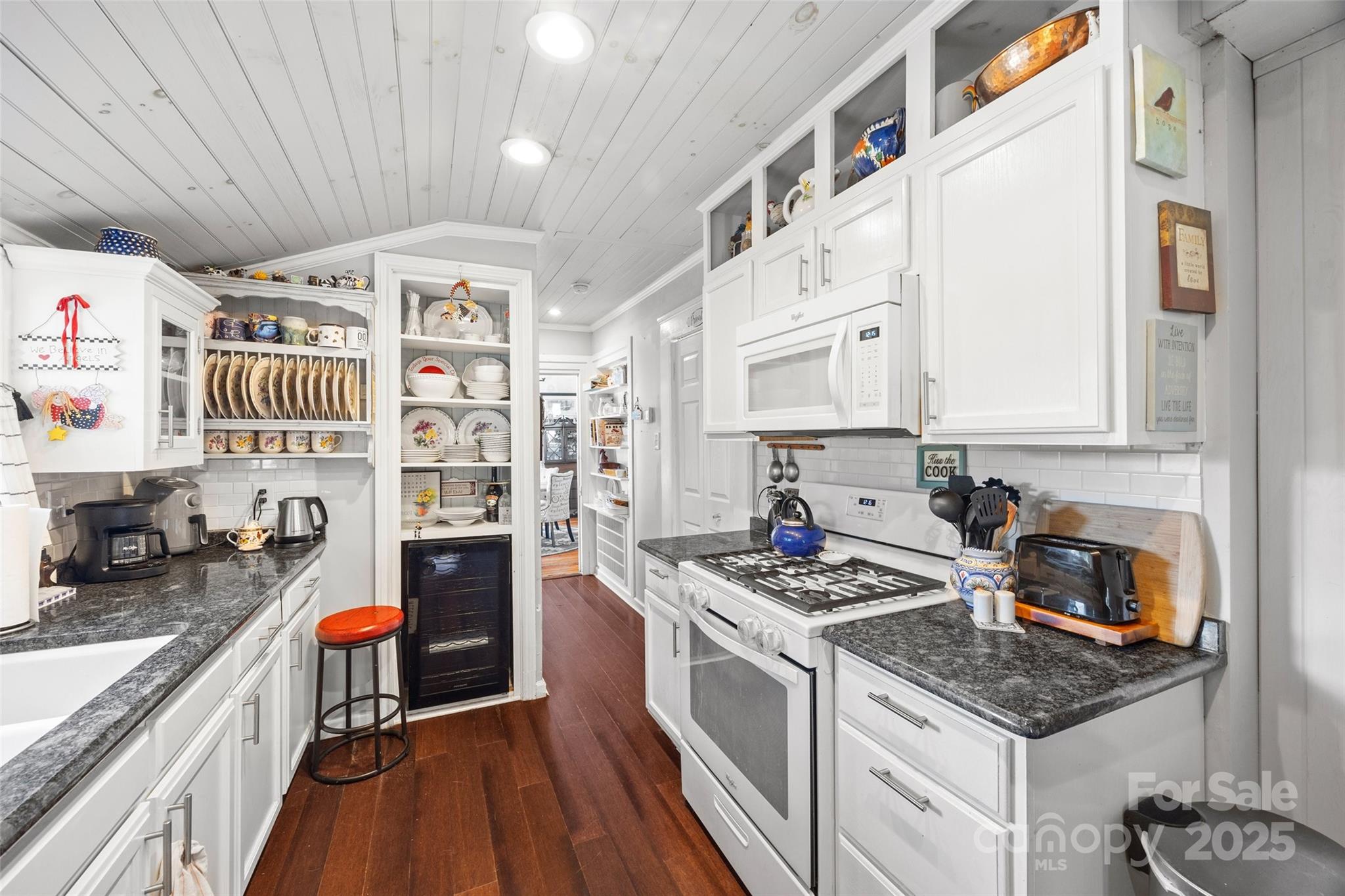 205 East Jefferson Street York, SC 29745 - Photo 13 of 35 a kitchen with stainless steel appliances granite countertop a stove and a sink