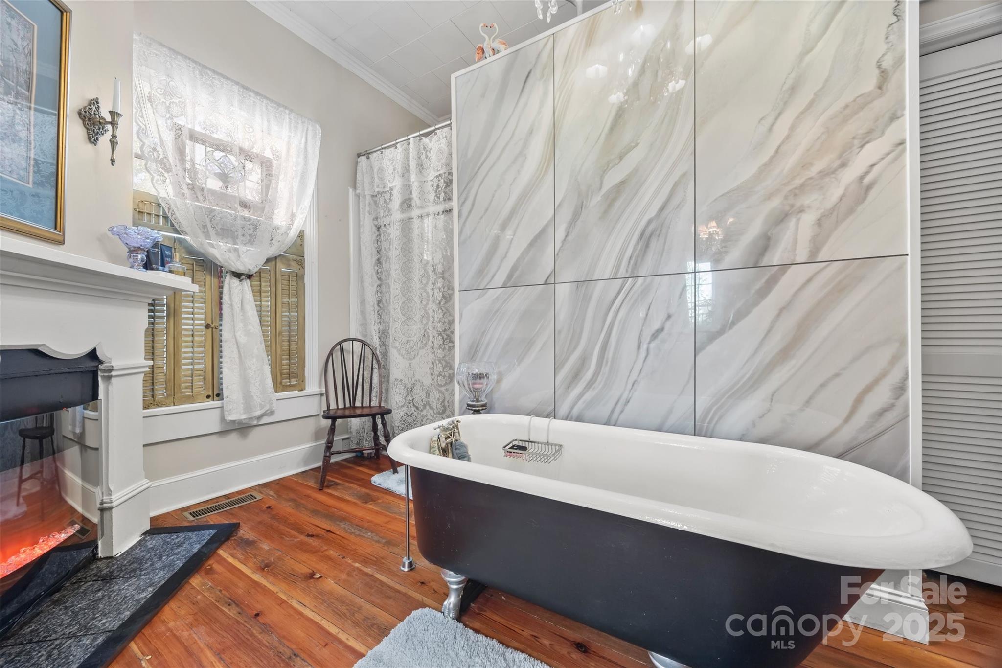 205 East Jefferson Street York, SC 29745 - Photo 17 of 35 a bathroom with a bathtub and a shower