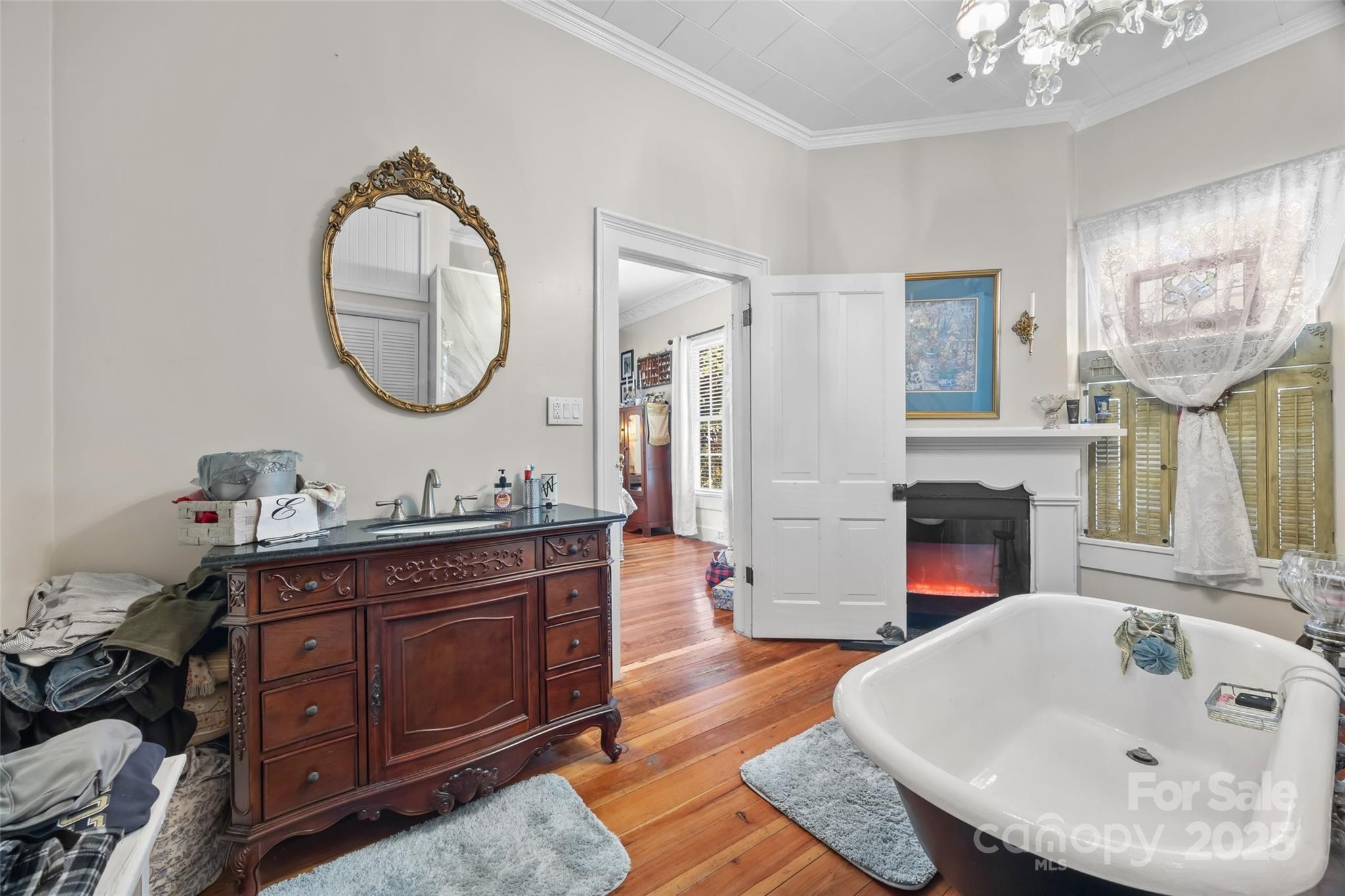 205 East Jefferson Street York, SC 29745 - Photo 18 of 35 a en suite bathroom with a double vanity sink and a mirror
