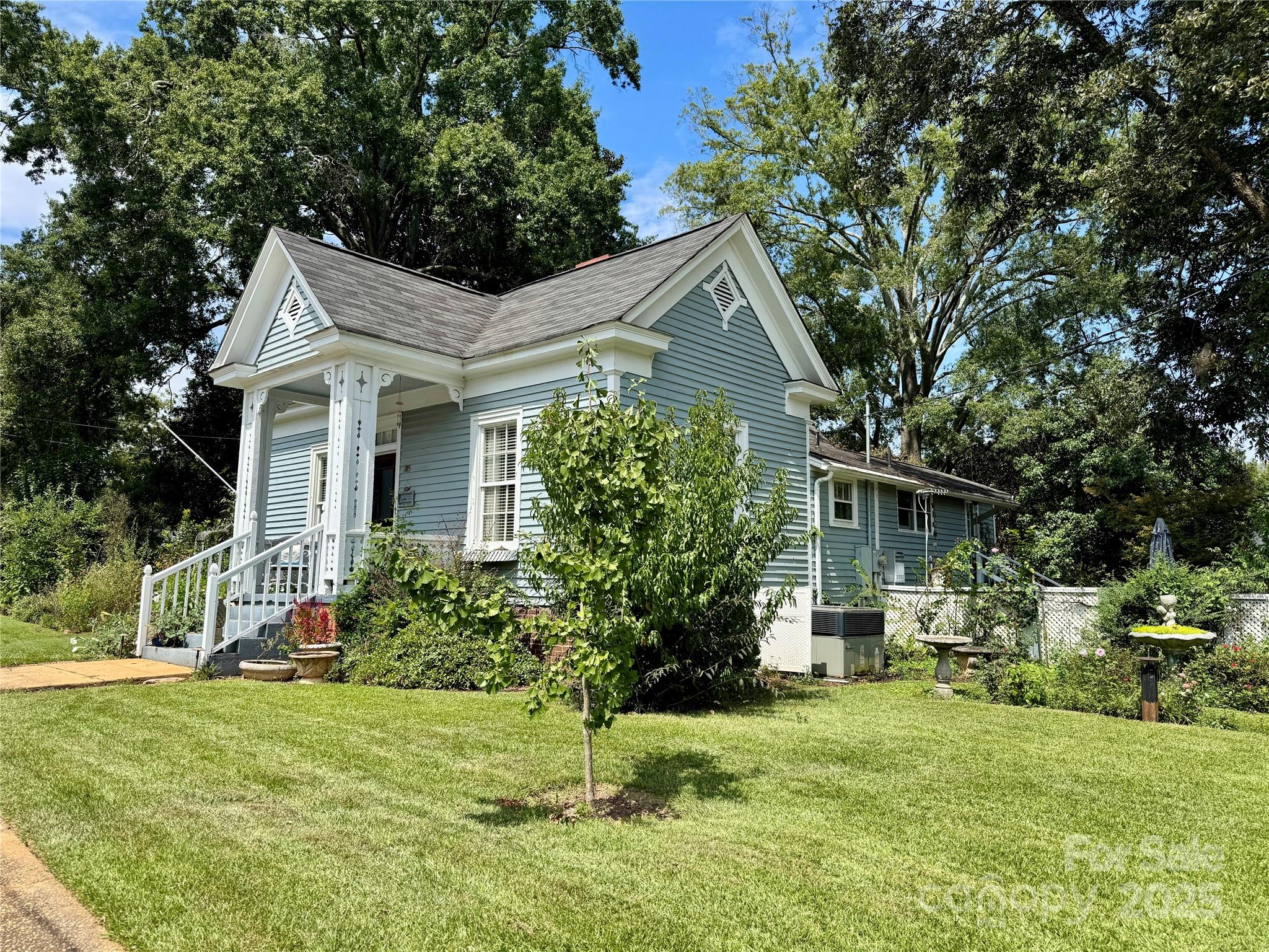 205 East Jefferson Street York, SC 29745 - Photo 2 of 35 a front view of house with yard and green space