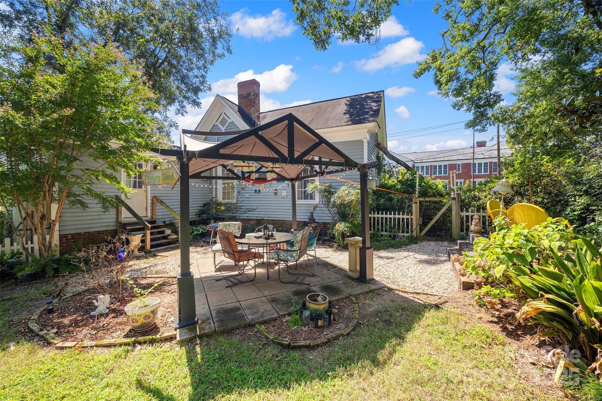 205 East Jefferson Street York, SC 29745 - Photo 24 of 35 a view of a playground with a patio