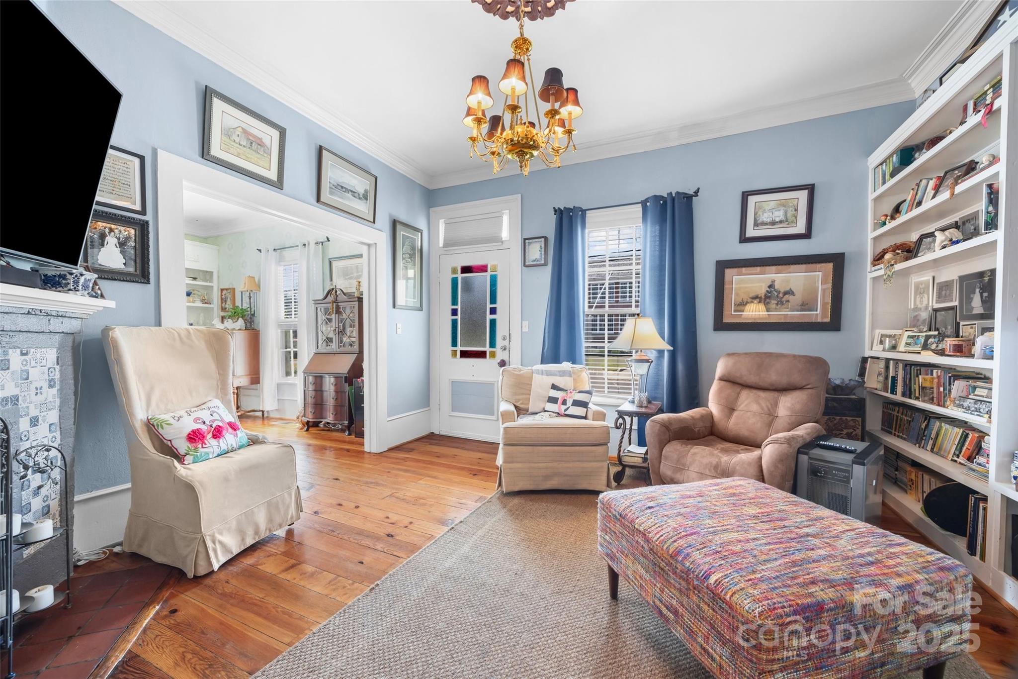 205 East Jefferson Street York, SC 29745 - Photo 4 of 35 a living room with furniture and a flat screen tv