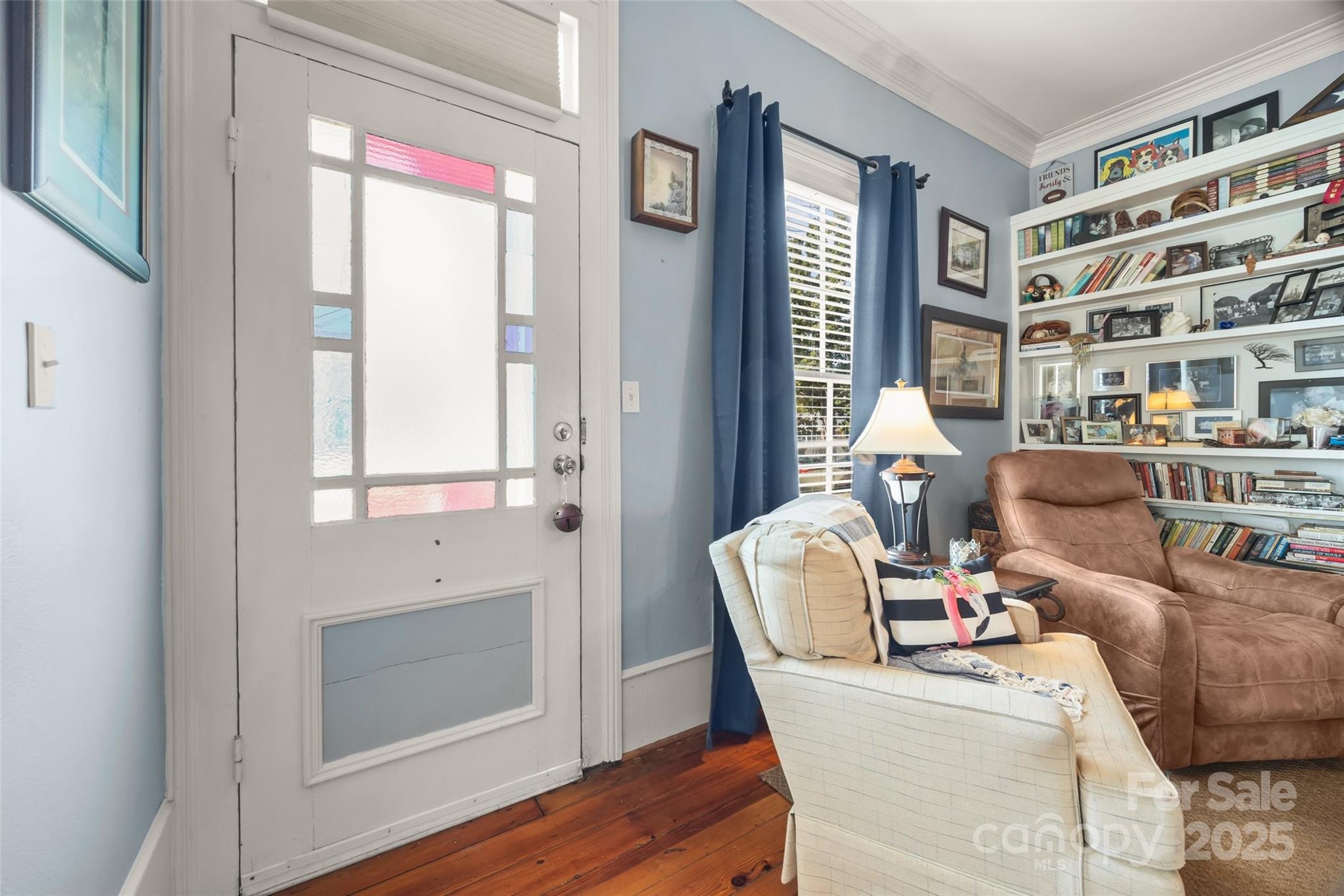 205 East Jefferson Street York, SC 29745 - Photo 5 of 35 a living room with furniture and a window