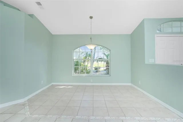 a bathroom with a toilet sink and a mirror