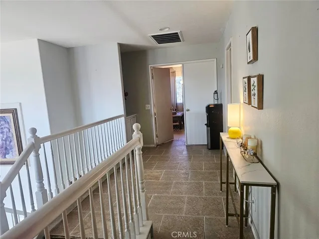 a view of a hallway with workspace