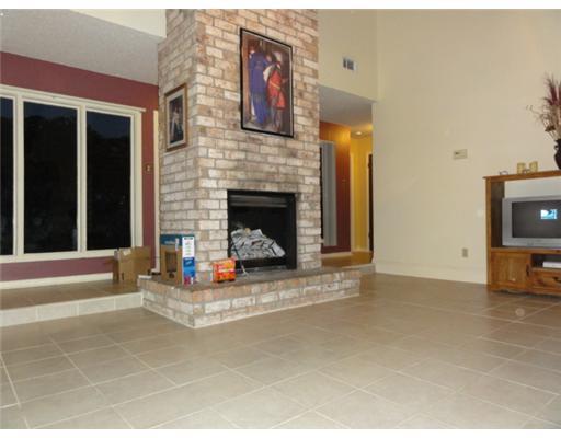 1615 Cheyenne Street Portland, TX 78374 - Photo 3 of 10 a living room with furniture and a fireplace