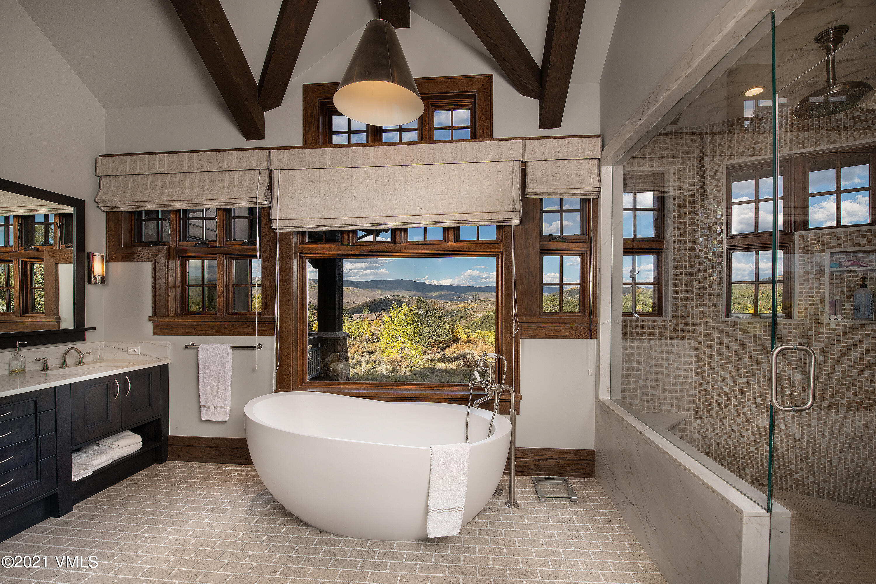 555 Red Draw Edwards, CO 81632 - Photo 13 of 24 a bathroom with a bathtub and a shower