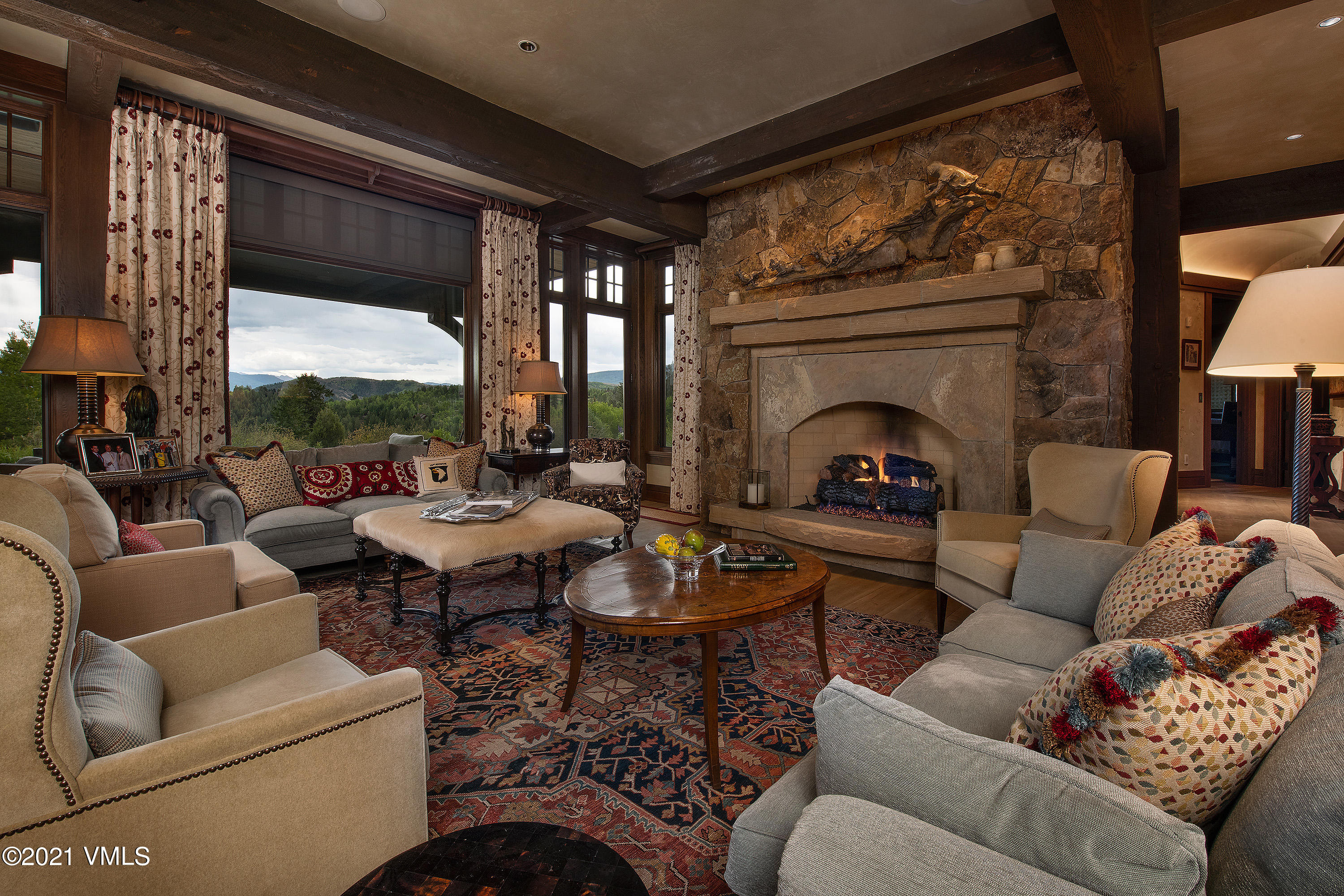 555 Red Draw Edwards, CO 81632 - Photo 14 of 24 a living room with furniture fireplace and a large window