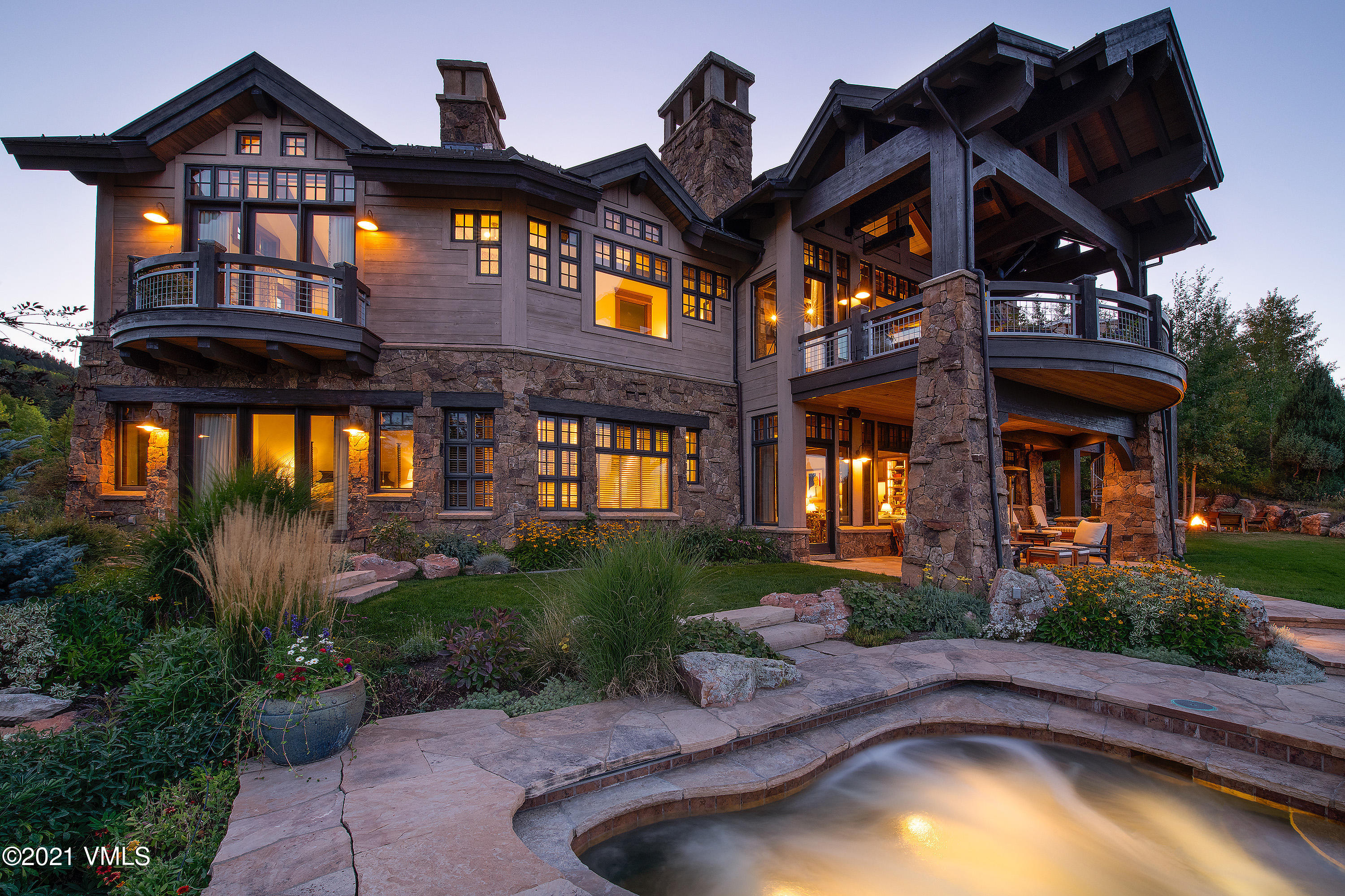 555 Red Draw Edwards, CO 81632 - Photo 17 of 24 a front view of a house with a yard table and chairs