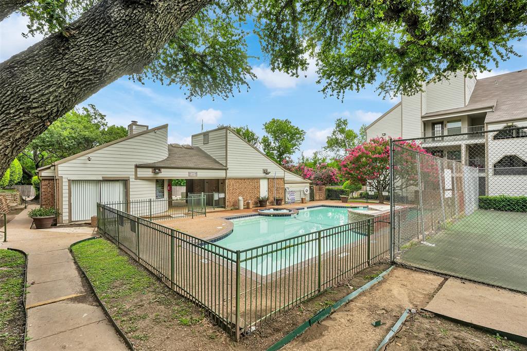 6108 Abrams Road, Unit 201 Dallas, TX 75231 - Photo 19 of 19 front view of house with a yard