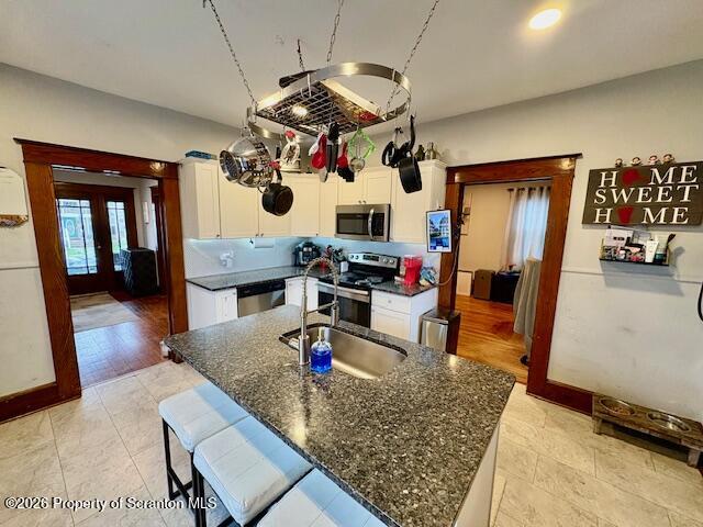 1200 Watson Street Scranton, PA 18504 - Photo 11 of 49 a living room with dining table furniture and a chandelier