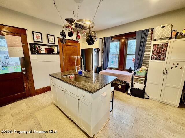 1200 Watson Street Scranton, PA 18504 - Photo 14 of 49 a kitchen with stainless steel appliances granite countertop a sink and a refrigerator