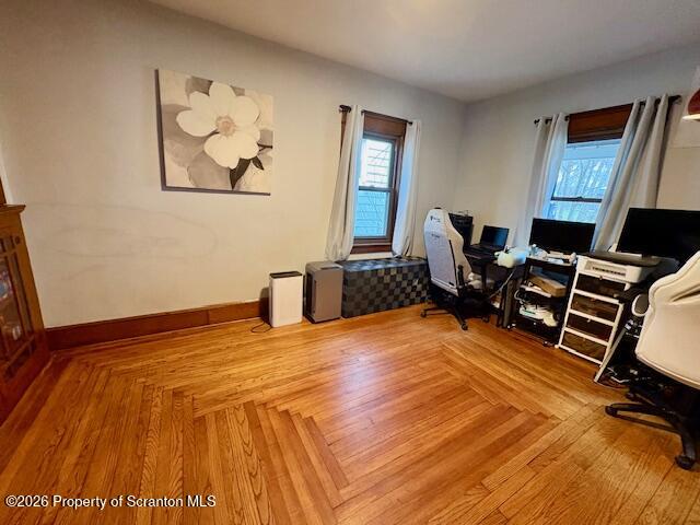 1200 Watson Street Scranton, PA 18504 - Photo 19 of 49 a bedroom with a bed and wooden floor