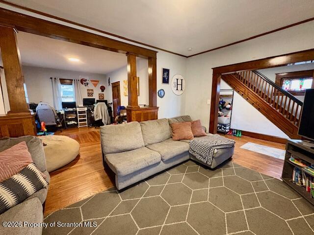 1200 Watson Street Scranton, PA 18504 - Photo 21 of 49 a living room with furniture a rug and a floor to ceiling window