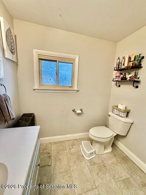 1200 Watson Street Scranton, PA 18504 - Photo 28 of 49 a bathroom with a toilet a sink and a mirror
