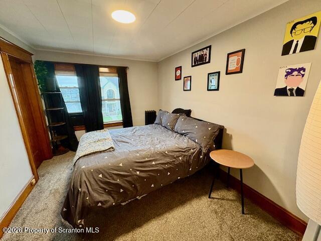 1200 Watson Street Scranton, PA 18504 - Photo 31 of 49 a bedroom with a bed and a dresser in it