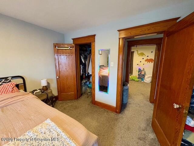 1200 Watson Street Scranton, PA 18504 - Photo 35 of 49 a bedroom with a bed and a mirror