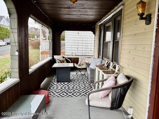 1200 Watson Street Scranton, PA 18504 - Photo 4 of 49 a balcony with furniture and window
