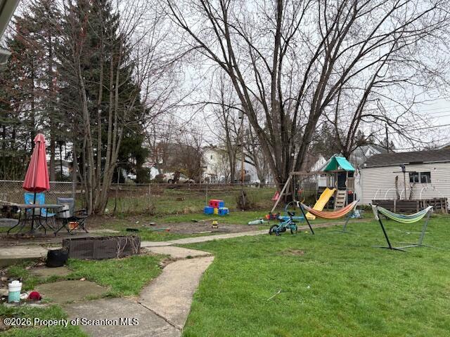 1200 Watson Street Scranton, PA 18504 - Photo 45 of 49 a view of a park with swings and slides