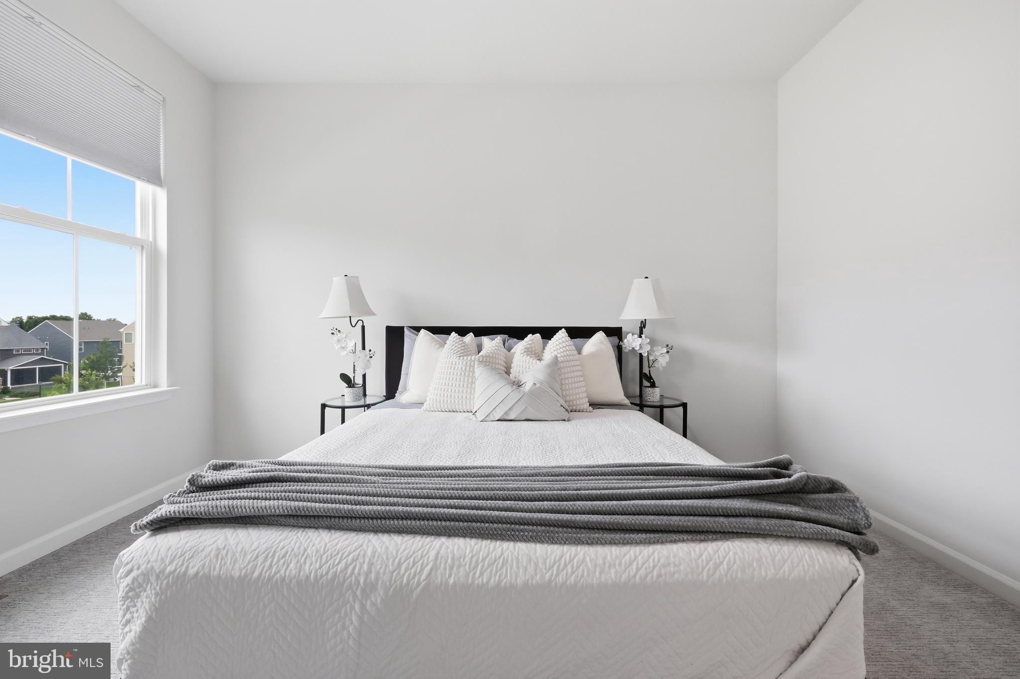 5707 Hawk Ridge Road Frederick, MD 21704 - Photo 58 of 109 a bedroom with a bed and window