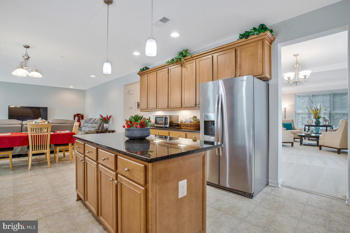 4006 Bridle Ridge Road Upper Marlboro, MD 20772 - Photo 14 of 45 a kitchen with stainless steel appliances granite countertop a refrigerator and a sink
