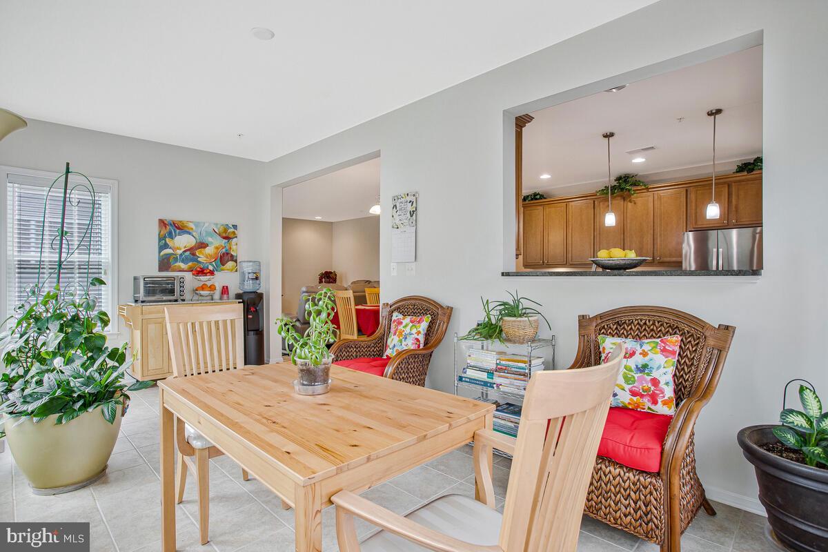 4006 Bridle Ridge Road Upper Marlboro, MD 20772 - Photo 20 of 45 a view of a dining room with furniture