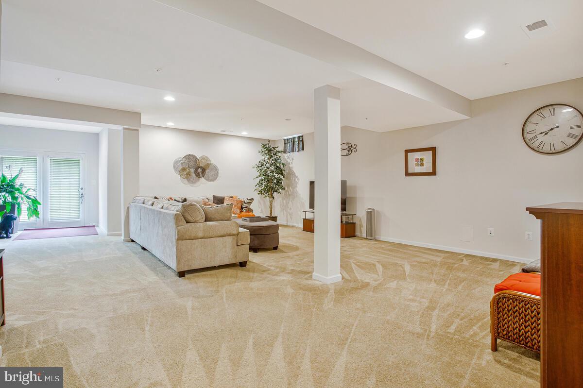 4006 Bridle Ridge Road Upper Marlboro, MD 20772 - Photo 23 of 45 a spacious bedroom with a bed and ceiling fan