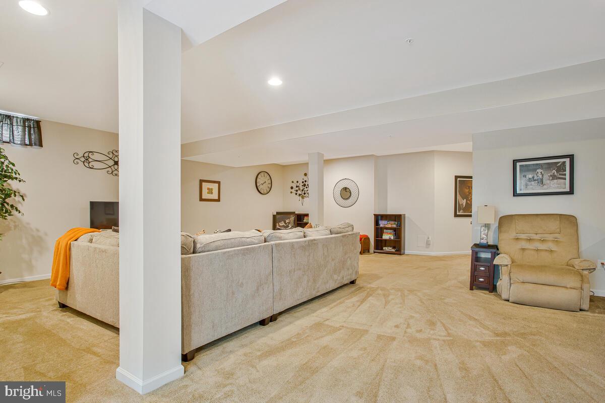 4006 Bridle Ridge Road Upper Marlboro, MD 20772 - Photo 25 of 45 a living room with furniture and a couch
