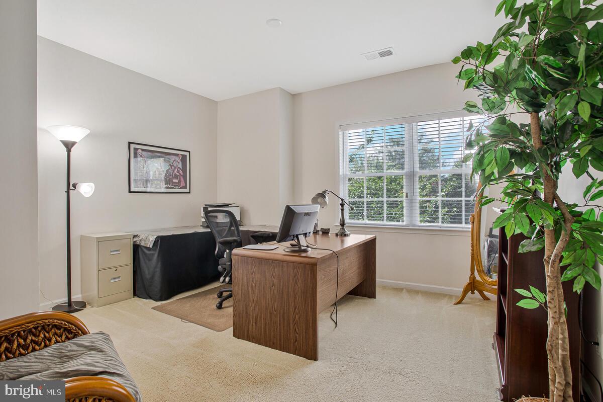 4006 Bridle Ridge Road Upper Marlboro, MD 20772 - Photo 34 of 45 a work room with furniture and potted plants