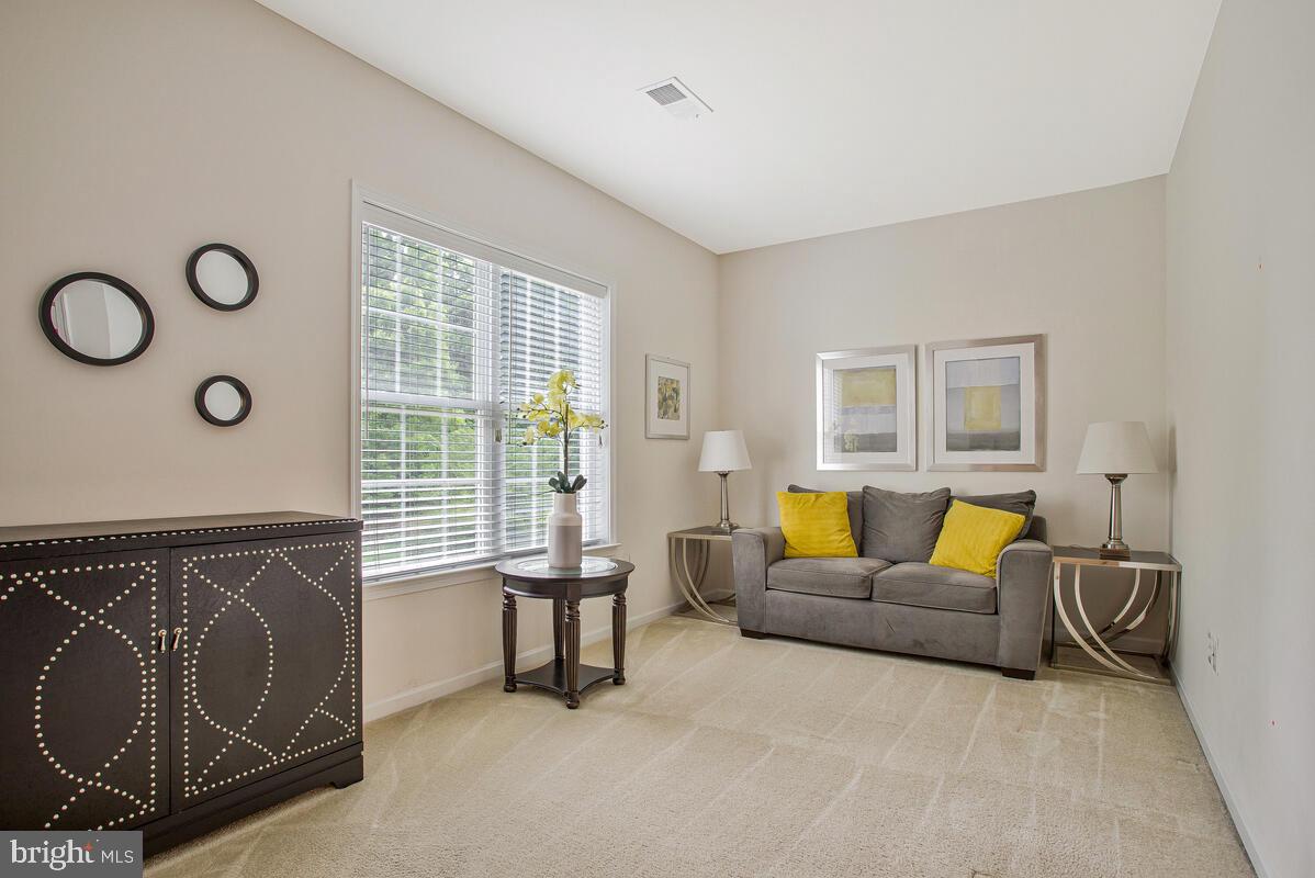 4006 Bridle Ridge Road Upper Marlboro, MD 20772 - Photo 38 of 45 a living room with furniture and a window