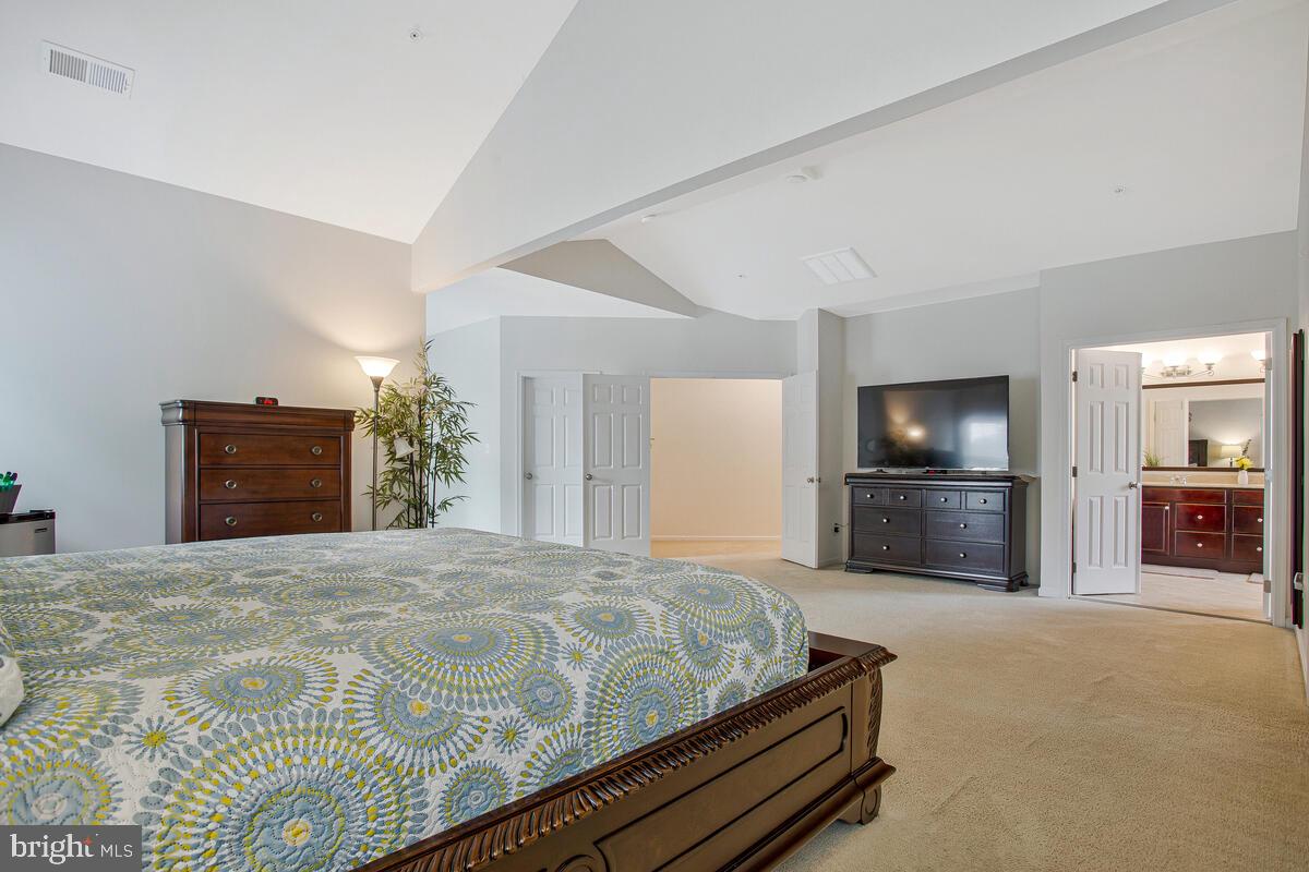 4006 Bridle Ridge Road Upper Marlboro, MD 20772 - Photo 40 of 45 a bedroom with a bed and a television