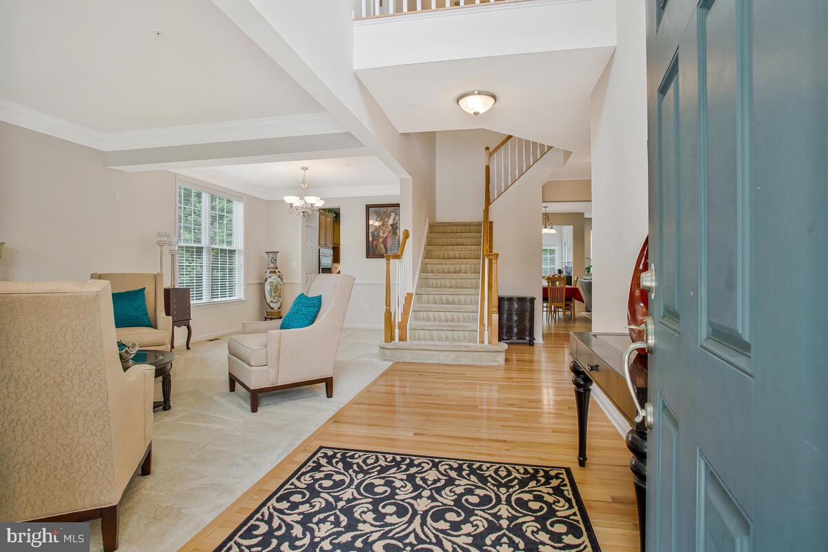 4006 Bridle Ridge Road Upper Marlboro, MD 20772 - Photo 4 of 45 a living room with furniture and a rug